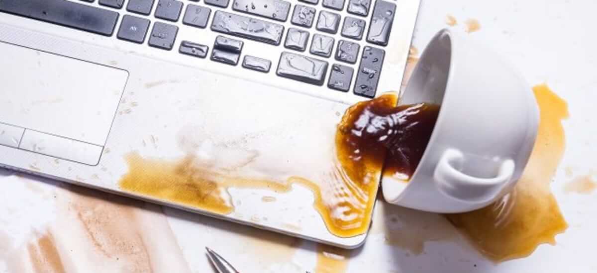 Laptop was spilled with liquid in high barnet